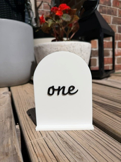 Single black arch table number for elegant wedding reception or party
