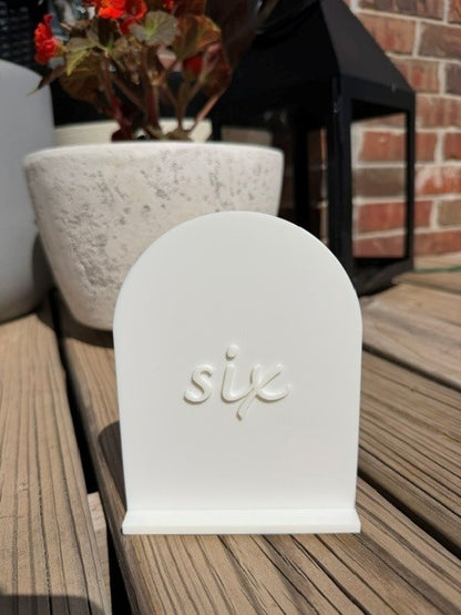 White arch table number 6 for bridal shower, birthday, or reception table display